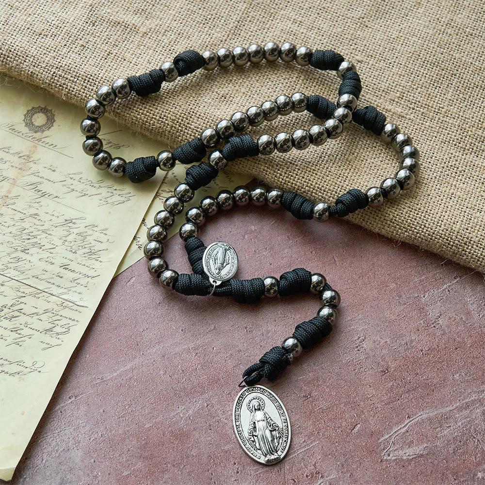 Seven Sorrows Paracord Rosary: A Symbol of Marian Compassion & Miraculous Grace