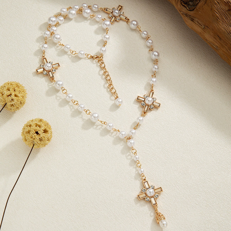 Elegant Cross Rosary Necklace with Gold-Tone Details & White Beads: A Reminder of Divine Grace