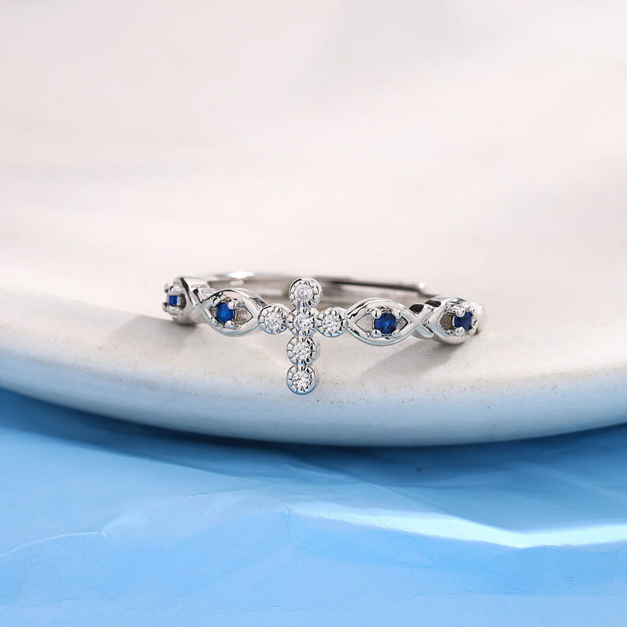 Dainty Cross Ring with Blue Zircon Accents: A Symbol of Faith and Serenity