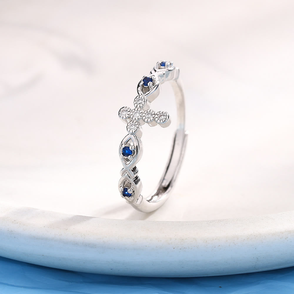 Dainty Cross Ring with Blue Zircon Accents: A Symbol of Faith and Serenity
