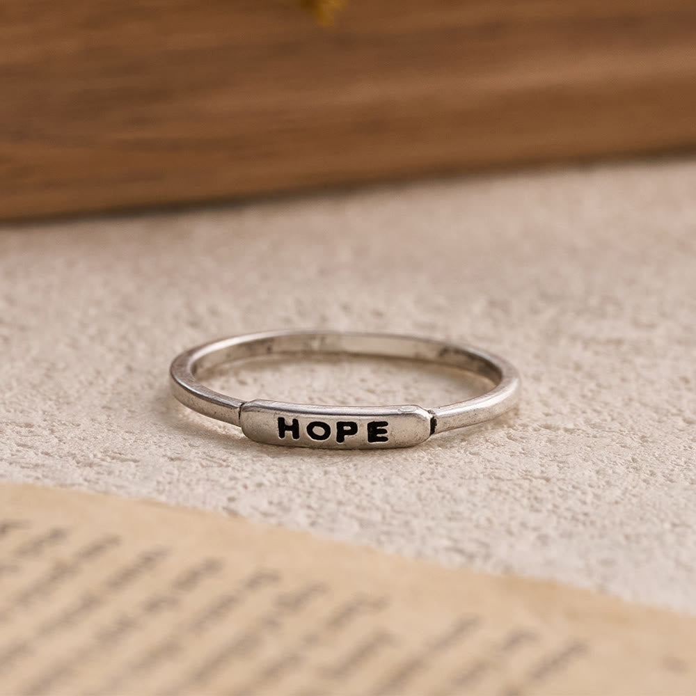 Refined Stackable Ring Set with Engraved BLESSED/FAITH/HOPE Text: An Emblem of Quiet Devotion