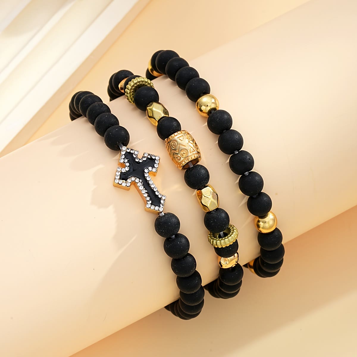 Multi-Layer Matte Black Stone Bead Stretch Bracelet with Paved Zircon Cross & Carved Gold Spacers