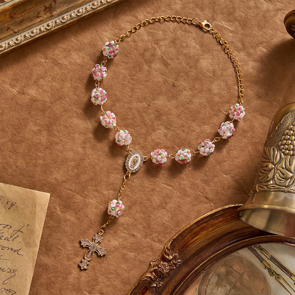 Ornate Jeweled Gold Cross Floral Glass Car Rosary: Token of Heavenly Travel Protection